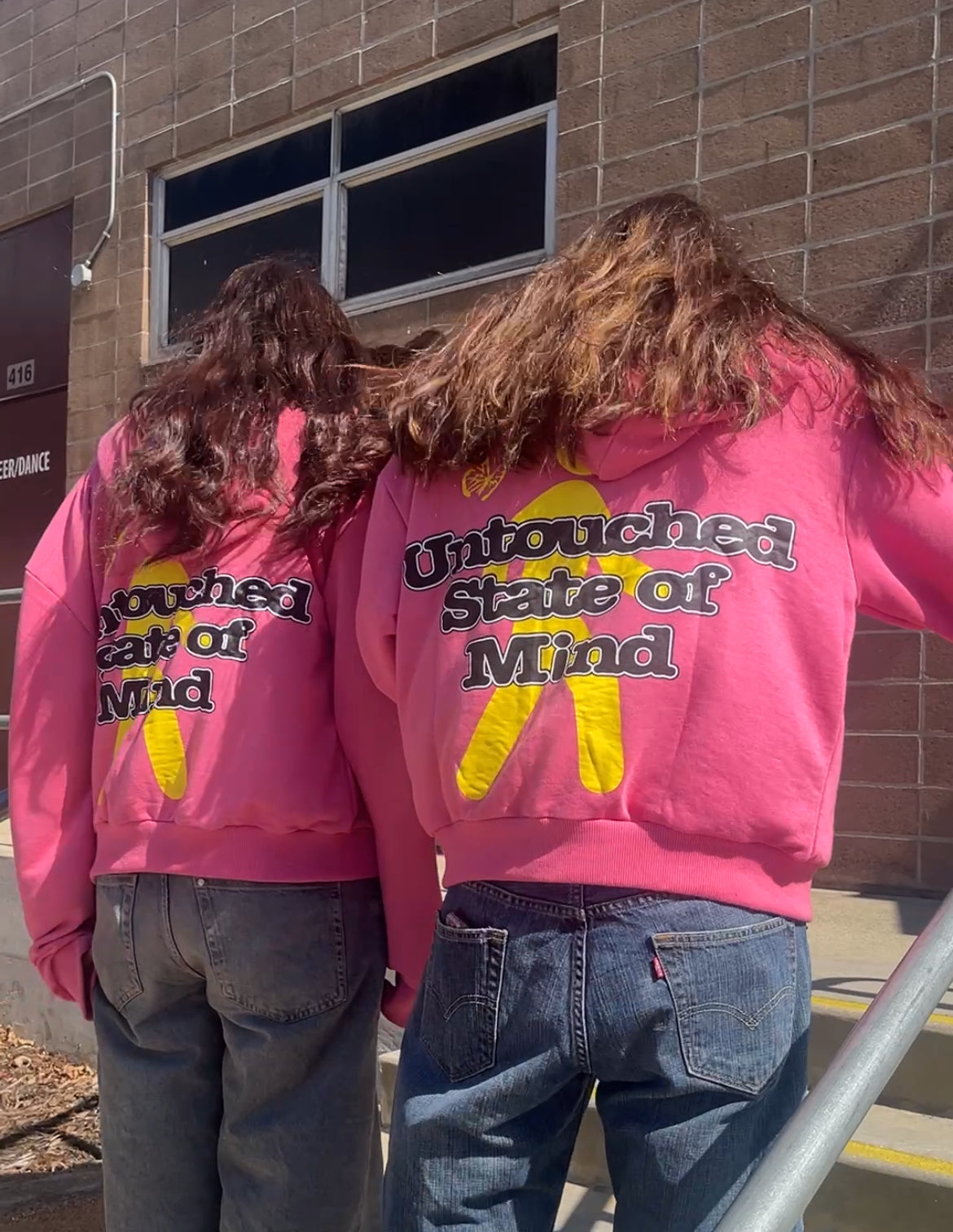 pink and yellow zip-up