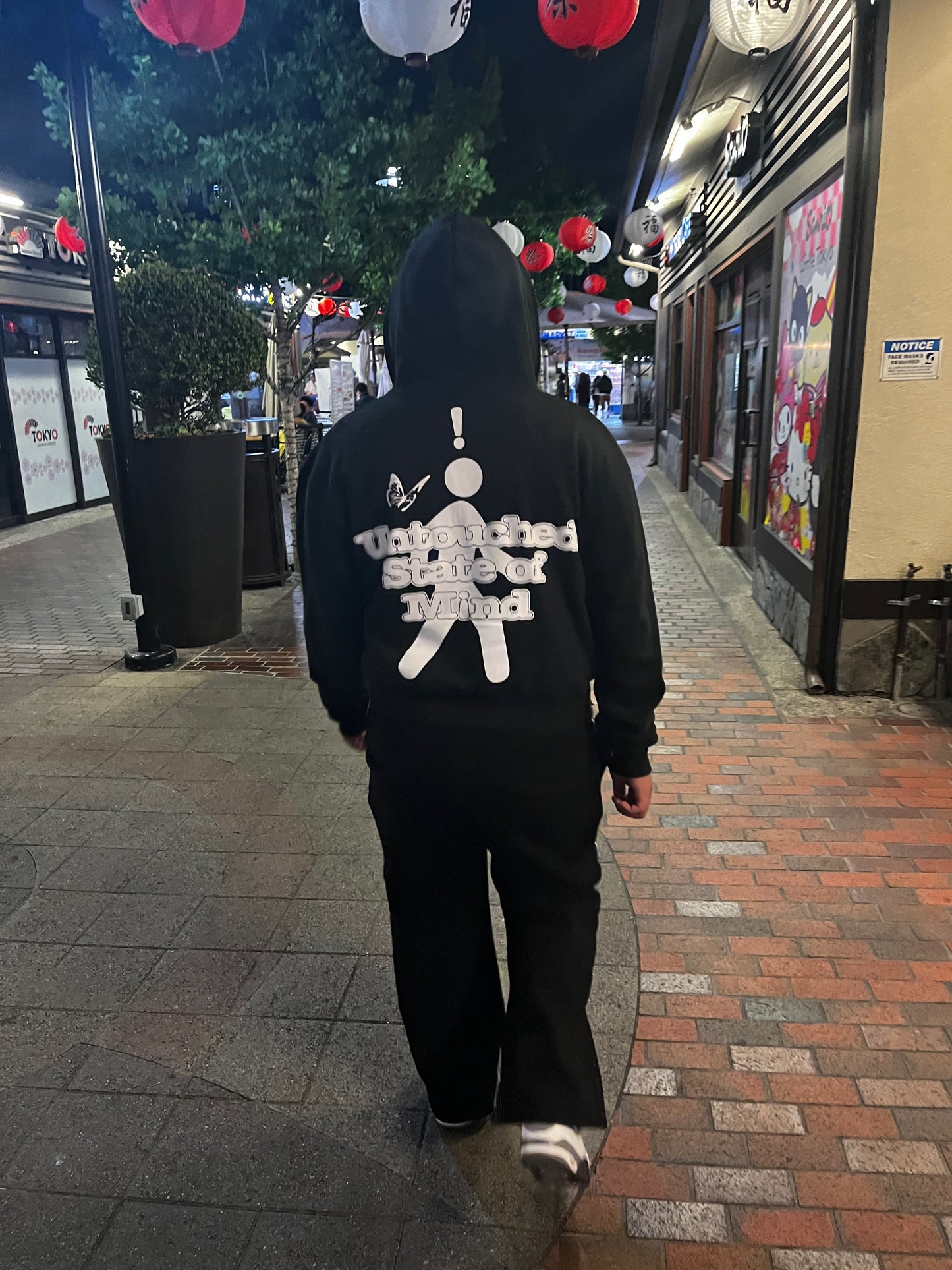 black and white zip-up